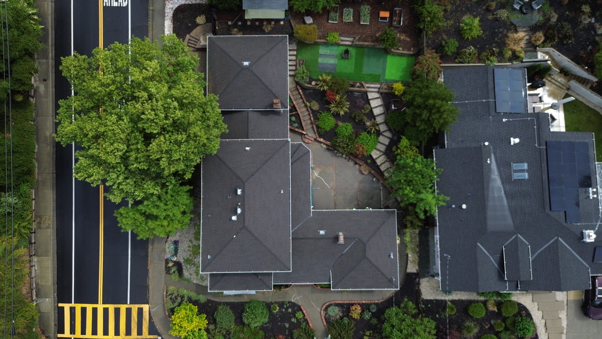 Golden Heights Roofing - Aerial view of a Bay Area residential roof showing shingle condition and surrounding neighborhood
