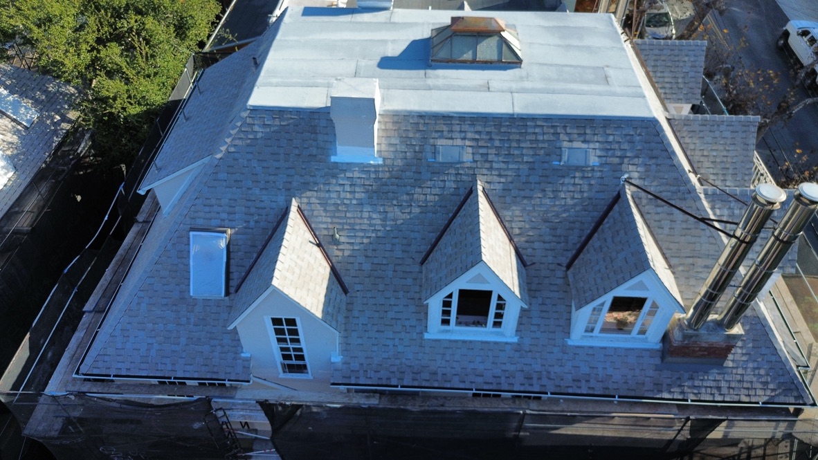 TPO membrane installation showing heat-welded seams on a Bay Area flat roof