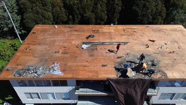 Roof installation for new home addition with seamless tie-in